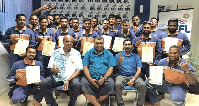 Ministry of Forestry officials Assistant Director Forestry officer North Uraia Racule and director training Taniela Whippy with Energy Fiji Limited District Superintendent North Jitendra Goundar and 21 staff during the graduation in Labasa on October 28, 2022. Photo: Shratika Naidu
