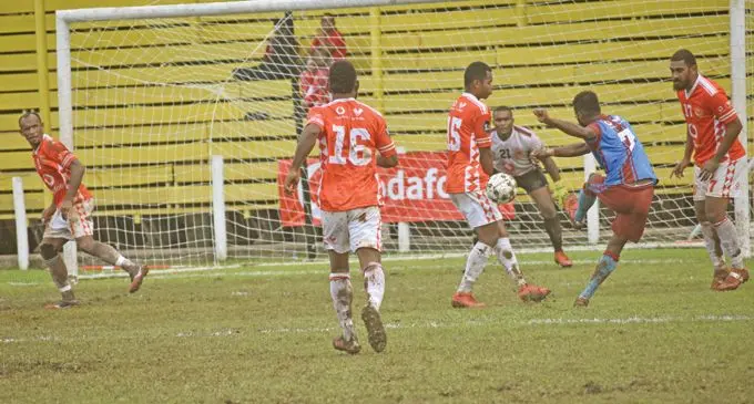 Nasinu striker Noa Seru (7) aims for goal ad goalkeeper Sairusi Bokini waits during the Vodafone Fiji FACT clash at Subrail Park, Labasa, on November 26, 2020. Photo: Sereana Salalo