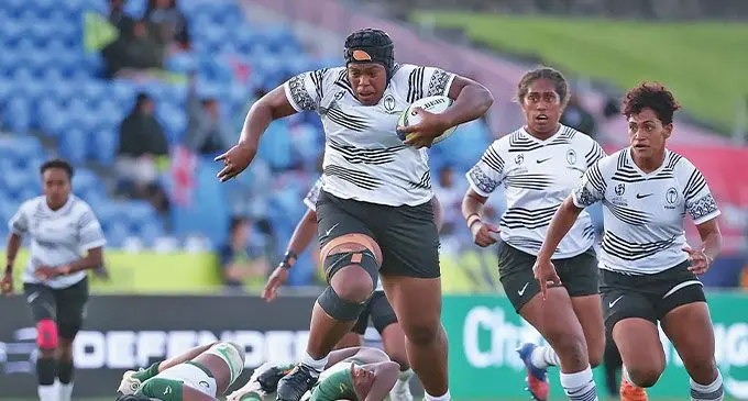 Vodafone Fijiana XVs tighthead prop Siteri Rasolea on a rampaging run against South Africa with Bitila Tawake next to her and Bulou Vasuturaga (right) in support during the 2022 Women’s Rugby World Cup in Auckland, New Zealand. Fijiana XVs won 21-17. Photo: World Rugby