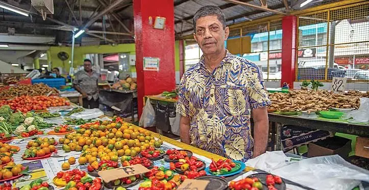 Market vendor, Ranjit. Photo: Leon Lord