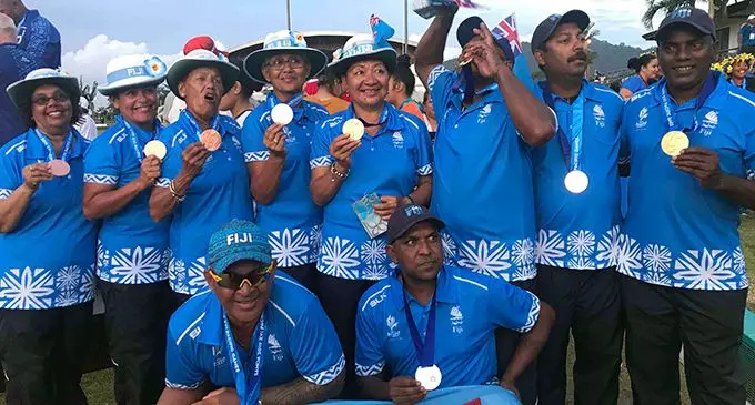 Team FIji lawn bowlers posing with their medals in Samoa. Photo: Anasilini Natoga