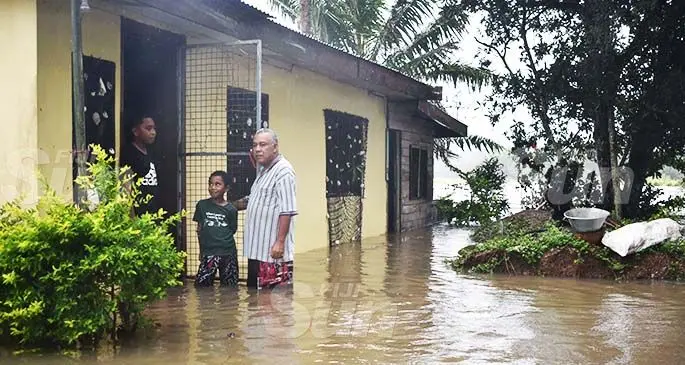 Alfred Sovea with his two sons, Joseph and Allen in Olosara, Nadroga yesterday. Photo: Waisea Nasokia 