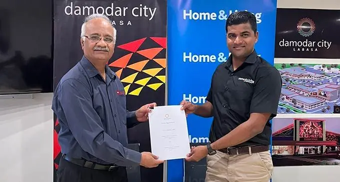 GM Sales & Operations Home & Living  Ronald Narayan and CFO Damodar Group  Dipak Patel at the signing of the Lease  Agreement on August 15, 22. Photo: Damodar City
