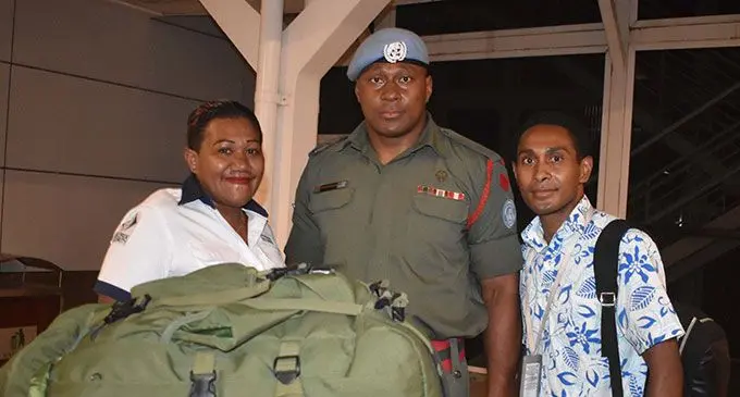 Corporal Paula Dranisinukula (centre) with relatives at Nadi International Airport on April 15, 2022 . Photo: Mereleki Nai