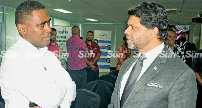 University of South Pacific Students association vice president Lepani Naqarase (left) with Attorney-General Aiyaz Sayed-Khaiyum during  World Consumers Rights Day 2022 in Suva on March 15, 2022. Photo: Ronald Kumar.