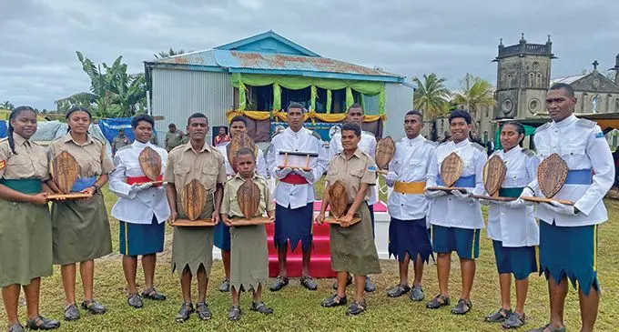 Baton of Honour recipient, Petero Raicama (center) with his fellow awardees after the Rewa Secondary School Cadet passing out parade. Photo: Kelera Tuisawauu