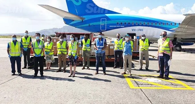 United States Deputy Chief of Mission Antone Greubel (far right) with organisation reps with the cargo at the Nadi International Airport on August 24, 2020. Photo: Waisea Nasokia 
