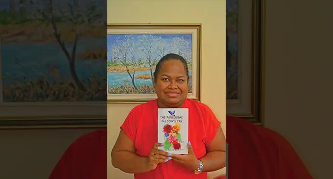 Kelera Tuvou-Ganivatu with a copy of her poetry collection book ‘The Peregrine Falcon’s Cry