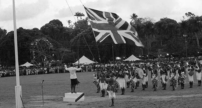 The Union Jack being lowered. Photo: National Archives of Fiji