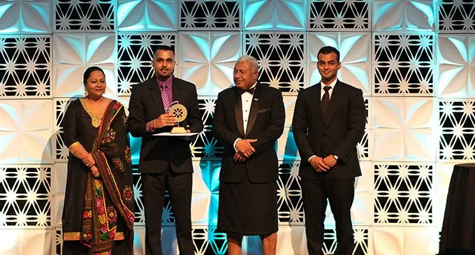 CBS Power Solution (Fiji) general manager Amit Singh holding the Execellence in Business Leadership Award at the 2018 Prime Minister's International Business Awards.