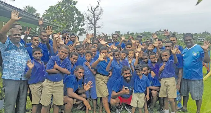 Lautoka football players with children oif the Sunshine Special School in Lautoka on February 15, 2018.  Photo: Karalaini Tavi