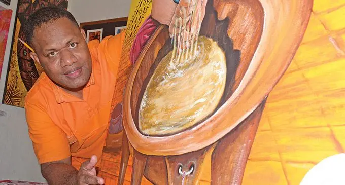 Corrections Service Resident artist- Isoa Codrokadroka showing one of his art pieces. Photo: Ronald Kumar