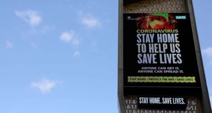 A digital billboard near the North Circular road displays a message urging people to stay home to slow the spread of the COVID-19, near London, Britain, on March 31, 2020. (Photo by Tim Ireland/Xinhua)
