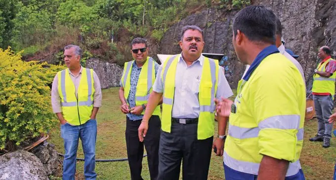 WAF board chairperson, Bhavesh Kumar, WAF board director, Kamal Gounder and WAF board director, Hemant Kumar during a site inspection at the Vaturu Dam. Photo: Water Authority of Fiji