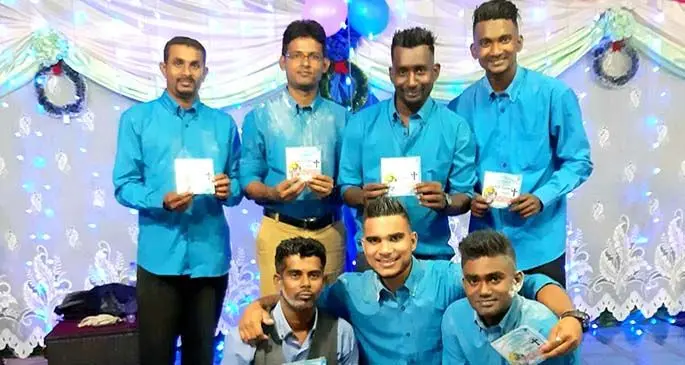 Lead singer and composer Sanil Sami (standing third from left) with his Gospel group team in Labasa.