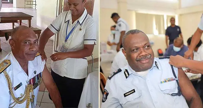 Republic of Fiji Military Forces Commander Rear Admiral Viliame Naupoto gets his first dose of the AstraZeneca vaccine at the Queen Elizabeth Barracks in Nabua on April 6, 2021. Photo: Republic of Fiji Military Forces and  Acting Commissioner of Police Rusiate Tudravu gets his COVID vaccination shot from staff nurse, Susana More at the Police Gym in Nasova on April 6, 2021. Photo: Police Media Cell