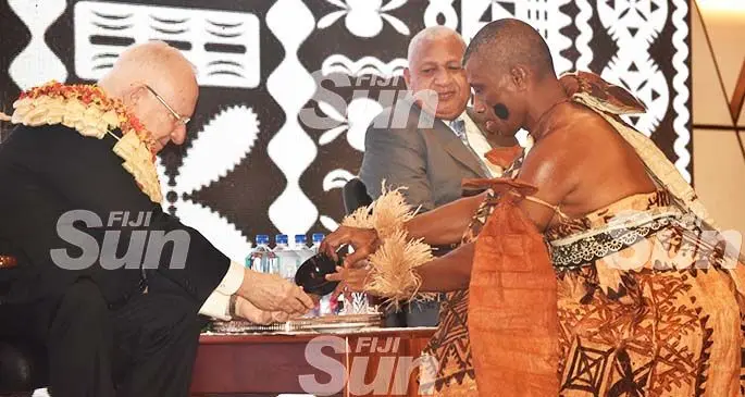 President of the State of Israel, Reuven Rivlin receives his bowl of grog as the Prime Minister Voreqe Bainimarama looks on at the Pullman Resort Nadi Bay yesterday. Photo: Waisea Nasokia 