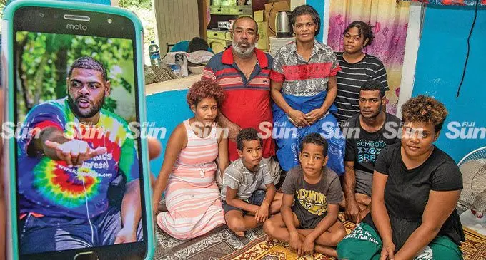Family members of the deceased Lemeki Duidomo. From left Jasiliva Rokobote (sister) Sailasa Rasala (father) Teresia Ema (mother) Meresiana Naioba (sister) Viliame Ucuna (brother) Sulueti Tolevu (sister-in law) and nephews Vilimone Lacanivalu, 8, and Mataisi Bulivou, 10, at their home in Lami village on April 3rd 2022. Photo: Leon Lord