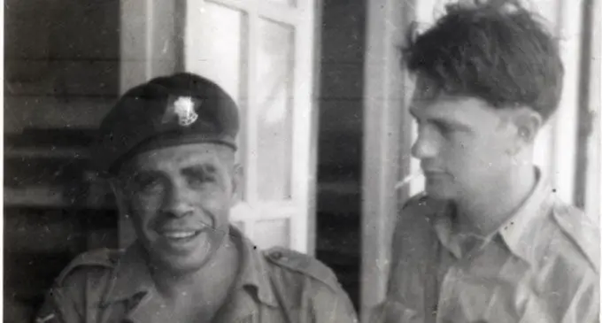 Australian Serviceman Laurence Turner (right) with a Fijian sergeant in Malaya in 1955.