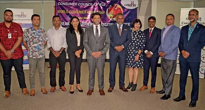 From left: MFS Sales and Distribution Lead Digicel Fiji John Qiliho, Regional technical specialist of the United Nations Capital Development Fund Ajay Jagannath, Vodafone Head of e-Commerce and Corporate Affairs Shailendra Prasad, Consumer Council of Fiji chief executive officer Seema Shandil, Attorney-General Aiyaz Sayed-Khaiyum, Minister for Trade and Tourism Faiyaz Koya, Nur Bano Ali of Fiji Chamber of Commerce, Consumer Council Board member Mohammed Gani, Fiji Higher Education Director Rohit Kishore and Financial Intelligence Unit Razim Buksh during  World Consumers Rights Day 2022 at Suvavou House in Suva on March 15, 2022.  Photo: Ronald Kumar