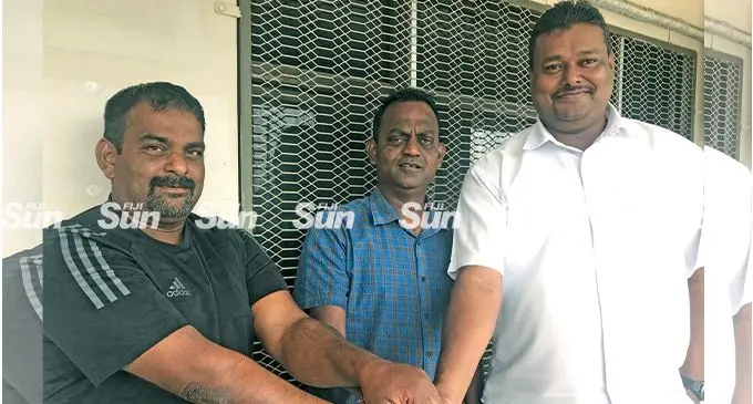 All in One Builders director Sulendra Raju (left), head coach Kamal Swamy and Nadi FA present Max Chetty in Nadi. Photo: Waisea Nasokia