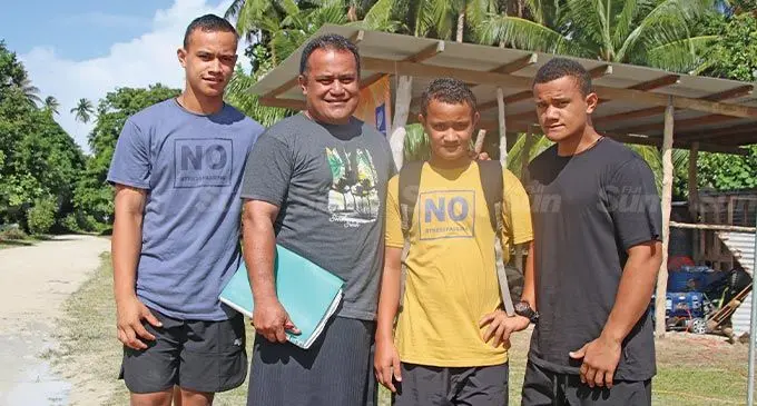 From left, Venasio Savea, 16, Joseph Savea (father), Lucas Savea, 13, and Daniel Savea, 15, after opening voluntary accounts with FNPF on September 5, 2022. Photo: Josefa Babitu