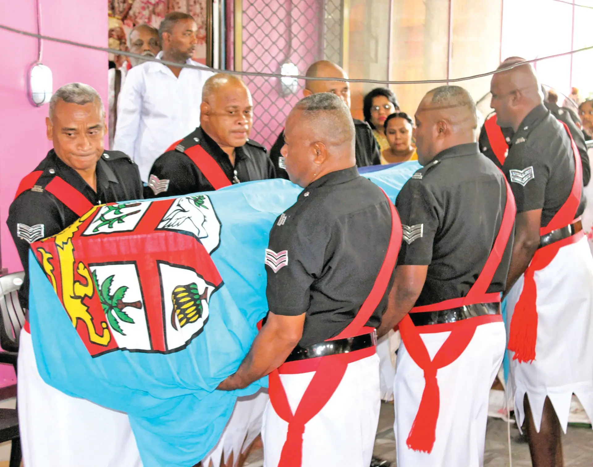 Members of the Fiji Police Force carry the casket of the late Dharmesh Krishna during his funeral service in Namara, Labasa on December 12, 2025