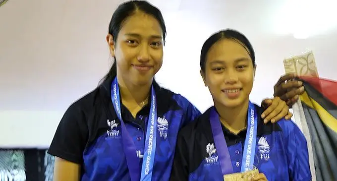 Sally Yee (left) with teammate and sister Grace in Apia, Samoa on July 13, 2019. Photo: Rosi Doviverata