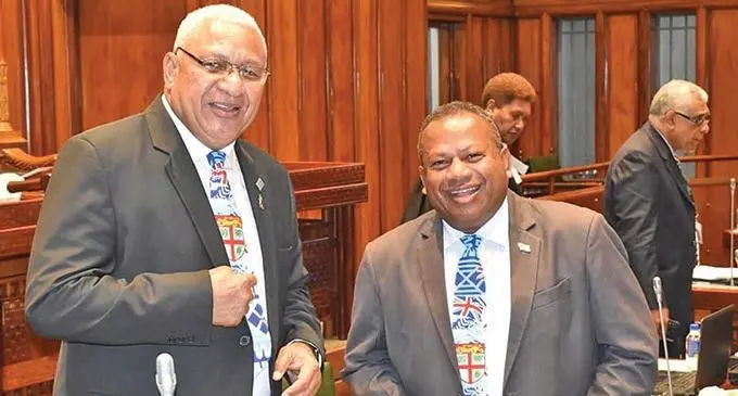 Prime Minister Voreqe Bainimarama and Minister for Defence, National Security and Policing, Rural and Maritime Development and Disaster Management, and leader of Government in Parliament Inia Seruiratu, with matching neckties in Parliament on December 8, 2020. Photo: Parliament News