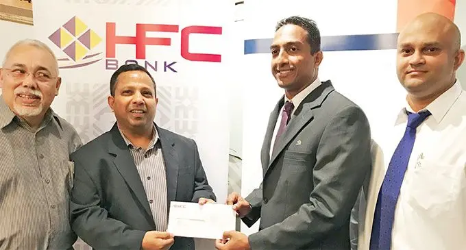 From left to right: Pacific Corporate Governance Institute (PCGI) Board member Nesbitt Hazelman, PCGI Board chairman Nouzab Fareed with HFC Bank Head of Operational Risk & Compliance Gitesh Nair and HFC Bank General Manager Operations & Transformation Admond Chandra during the cheque presentation on March 25, 2019. Photo: HFC Bank