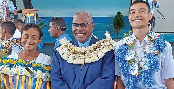 Minister for Justice Siromi Turaga is flanked by the Natabua High School head girl Manuokepa Ili Monise and head boy Titifanue Howard. Photo: Salote Qalubau