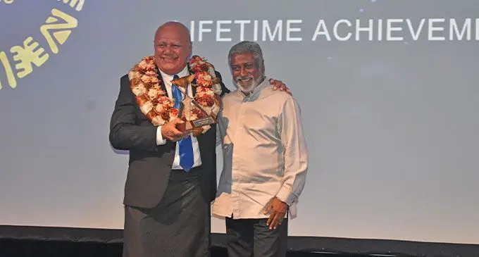 Deputy Prime Minister and Minister for Tourism and Civil Aviation Viliame Gavoka (left), with Lifetime Achievement winner Damend Gounder at Sofitel Fiji Resort and Spa in Nadi. Photo: Waisea Nasokia