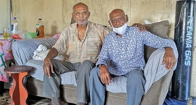 Two former Fijian football stars Zikar Ali (right) visits former national skipper George Koi at Newtown, Nasinu. Photo: EFFRA 