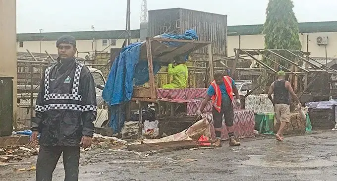 Police were present in some areas where the makeshift stalls were taken down in parts of Suva on December 17,2020. Photo: Kelera Sovasiga
