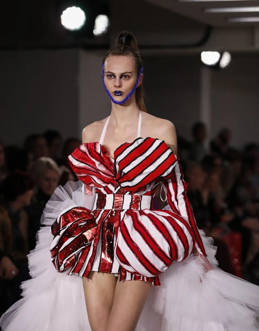 A model walks the runway at On|Off Presents... catwalk show during the London Fashion Week in London, Britain. (Xinhua/Han Yan)