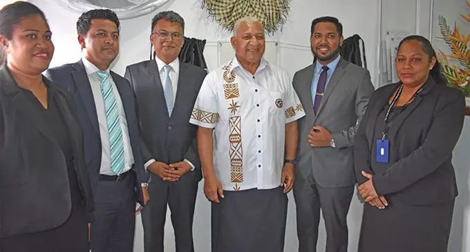 Legal Aid Commission Acting Director Shahin Ali (second from left), chairperson of the Legal Aid Commission Sharvada Sharma (third from left), Prime Minister Voreqe Bainimarama (fourth from left), with Legal Aid officers and officials during the opening of the Legal Aid office in Seaqaqa on March 13, 2019. Photo: Shratika Naidu  