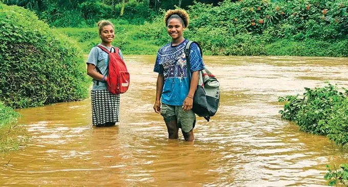 Adi Laisani Motea Tagicaki with her sister Adi Cinakoro Sevusevutabua could not go to school because the river was flooded on January 6, 2022. Photo: Laisa Lui