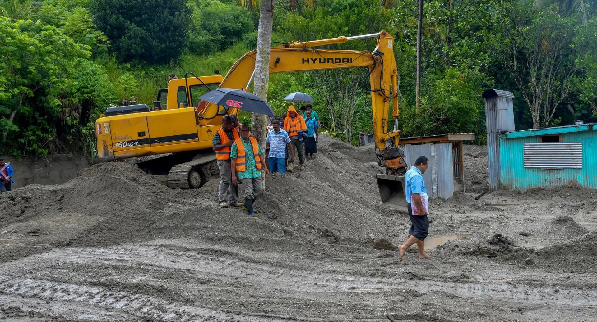 Minister for Infrastructure, Transport and Disaster Management, Jone Usamate witnessed firsthand the damage caused by the landslide. Photo: Department of Information