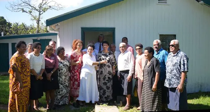 Mere Samisoni (middle) hands over the keys for the renovated teacher’s quarters to Ballantine Memorial  School Principal Miriama Naicegucegu and the school management on July 17, 2019. Photo: Ronald Kumar