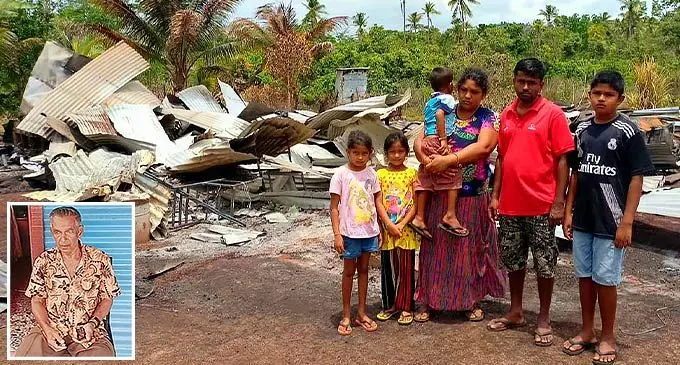 (Second from right) Shamal Narayan, 37, with wife, Sonam Lata, 27, and three children (from left) Shreya Lata, 7, Shaniya lata, 7, Shymal Narayan, 4 and Shynal Narayan, 12 at the remains of their burnt home which also claimed the life of family member, Ram Narayan 74, at Qaraniqoli Settlement in Dreketi last Friday. Inset: The late Ram Narayan.