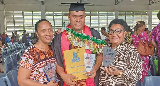 Jese Dautei Robinson with his wife-Siteri Tako and mother-Seini Dautei with three awards during the Then India Sanmarga Ikya {TISI) Sangam College of Nursing and Health Care Education graduation at the Civic Centre in Labasa on December 10, 2024.