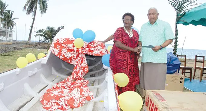 Prime Minister Voreqe Bainimarama handing over a new fibreglass boat at the Nosonoso Melanesian  Settlement in Ovalau during his visit on July 31, 2018.  Photo: Manhar Lal 