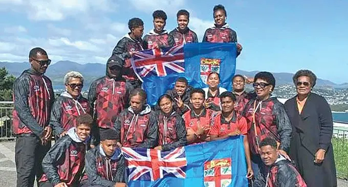 Lilian Amazon team with supporters and officials in New Zealand.