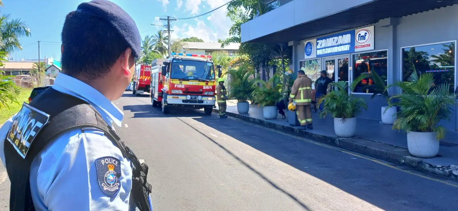 A police officer guards the Zamzam Restaurant where the alleged explosion occured.