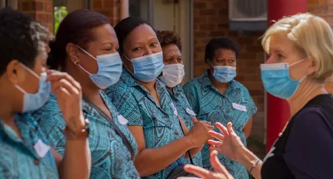 CapeCare chief executive Joanne Penman with new Fijian aged care workers.