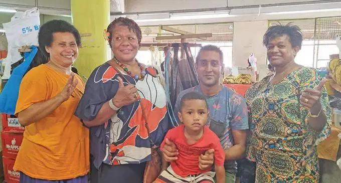 From left: Railala Temo, Eta Ula, Mohammed Aishad, Eddie and Asenaca Salusaluat the Suva Market on December 21, 2022. Photo: Laiseana Nasiga
