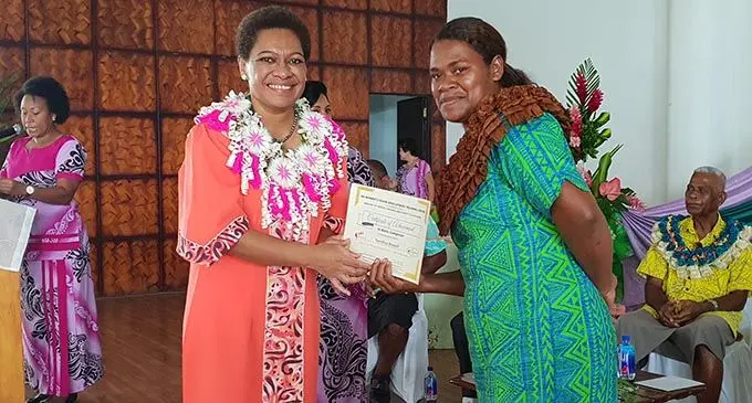 Serafina Ranadi (right) receiving her Certificates of Achievement in Basic and Advanced Computing from the Minister for Women, Children and Poverty Alleviation, Mereseini Vunwaqa during the Ba Women’s Forum graduation at Xavier College on October 24, 2020. Photo: Nicolette Chambers
