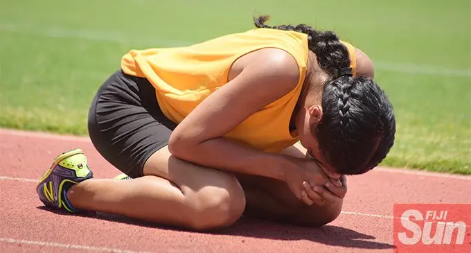 Suva Grammar School athlete, Priyanka Singh pray after winning their inter-house 800meters senior-girls final at ANZ Stadium on 9, 2019. Photo: Ronald Kumar.Priyanka Singh