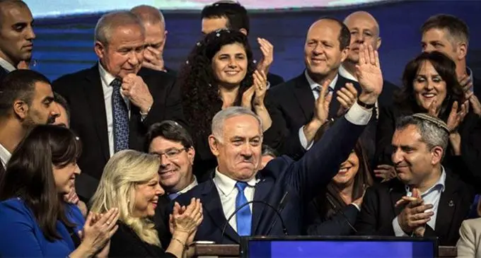 Israeli Prime Minister Benjamin Netanyahu with Likud party members after the announcement of the exit.  Photo: Arab Weekly