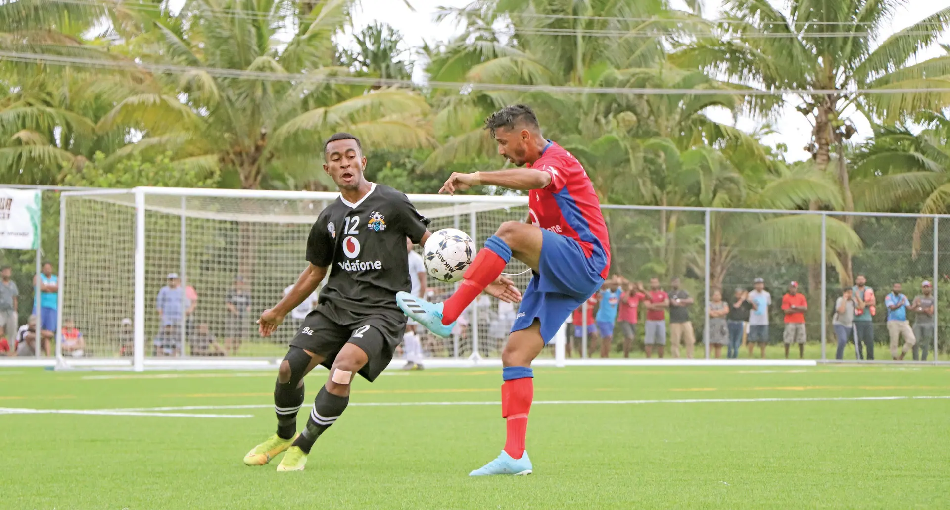 Ba right back Peceli Sukabula (12) defends against Navua captain Vineet Chand during their  Vodafone Premier League clash at the Uprising Fiji Beach Resort ground in Pacific Harbour, Deuba on September 12, 2020. Ba won 3-0. Photo: Fiji FA Media 